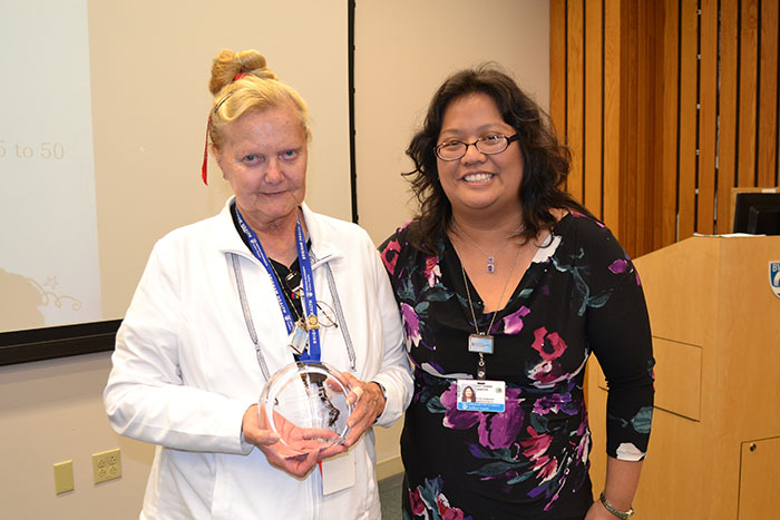 Director of Service Excellence and Performance Improvement  Kae Santos Right) honors Elizabeth &ldquo;Betty&rdquo; Podgurski for her  more than 10,000 of volunteer service